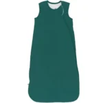 A deep green tone defines this sleeping bag for baby with a calm and structured look. The sleeveless design and smooth zipper make this baby sleeping bag tog practical and easy to use. Made from 100% cotton, it provides breathable, soft, and skin-friendly comfort. OEM & ODM services are supported, and production can be arranged in line with OEKO-TEX and GOTS standards.