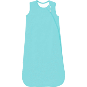 A clear aqua blue tone gives this sleeping bag for baby a fresh and vibrant look. The sleeveless cut and smooth side zipper make this baby sleeping bag tog practical for everyday use. Made from 100% cotton, it is breathable, soft, and gentle on baby skin. OEM, ODM, and customization services are available, with production aligned to OEKO-TEX and GOTS standards.