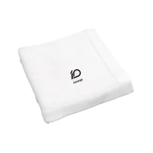 100% cotton blanket for baby in a solid cream shade. Features a breathable honeycomb knit and a purely handmade feel. OEM/ODM custom-ready; guaranteed to be capable of passing OEKO-TEX/GOTS.