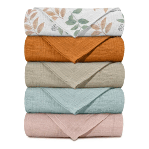 Professional-grade 100% cotton muslin. Primarily solid-colored with delicate botanical vine motifs. Highly absorbent and breathable for infant skin protection. OEM/ODM custom-ready; guaranteed capable of passing OEKO-TEX/GOTS.