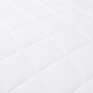 The outer mattress cover features a precision quilted diamond pattern that creates soft, breathable air pockets. This skin-friendly fabric delivers a naturally hypoallergenic touch for contract accounts.
