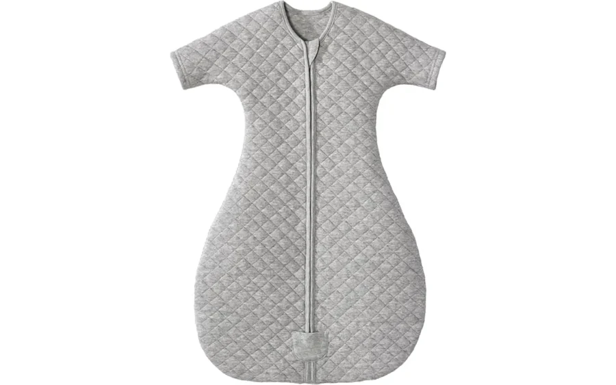 Heather grey diamond-quilted baby sleep sack features an ergonomic transition shape with short sleeves and a hip-healthy bell-shaped bottom. Purely handcrafted from 100% cotton, it ensures high absorbency, breathable softness, and total skin protection. Global B2B partners receive expert OEM, ODM, and Customized support, with all units guaranteed to pass GOTS and OEKO-TEX safety benchmarks.