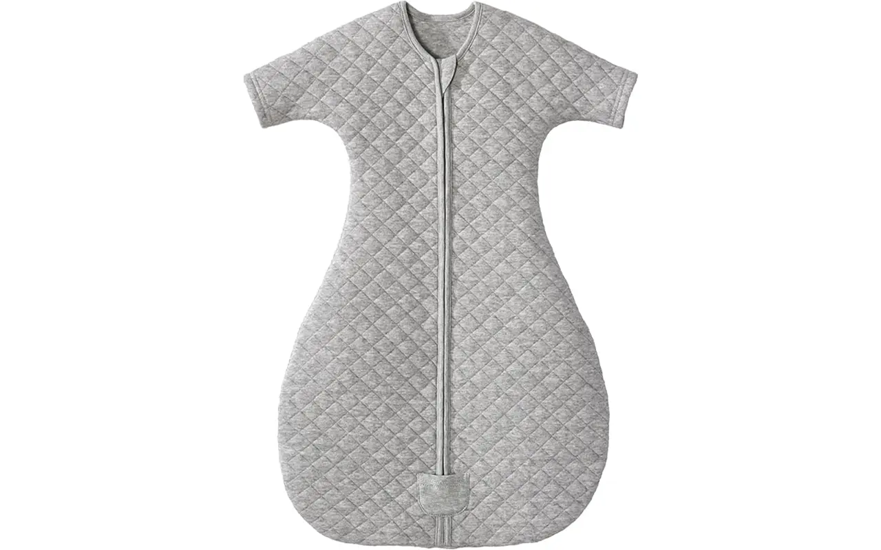 Heather grey diamond-quilted baby sleep sack features an ergonomic transition shape with short sleeves and a hip-healthy bell-shaped bottom. Purely handcrafted from 100% cotton, it ensures high absorbency, breathable softness, and total skin protection. Global B2B partners receive expert OEM, ODM, and Customized support, with all units guaranteed to pass GOTS and OEKO-TEX safety benchmarks.