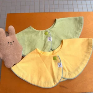 Shop the best baby bibs in vibrant solid citrus tones. Made from 100% combed cotton, we guarantee 2026 OEKO-TEX & GOTS compliance. Essential bibs for baby for premium OEM/ODM supply.