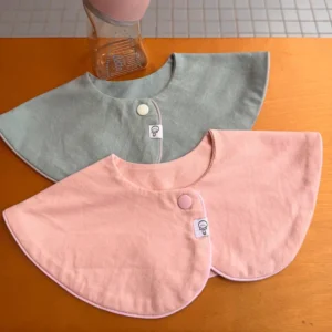 Select the best baby bibs in minimalist solid pastels. Made from 100% premium cotton, we guarantee full 2026 OEKO-TEX & GOTS safety. Ideal bibs for baby for OEM/ODM volume orders.