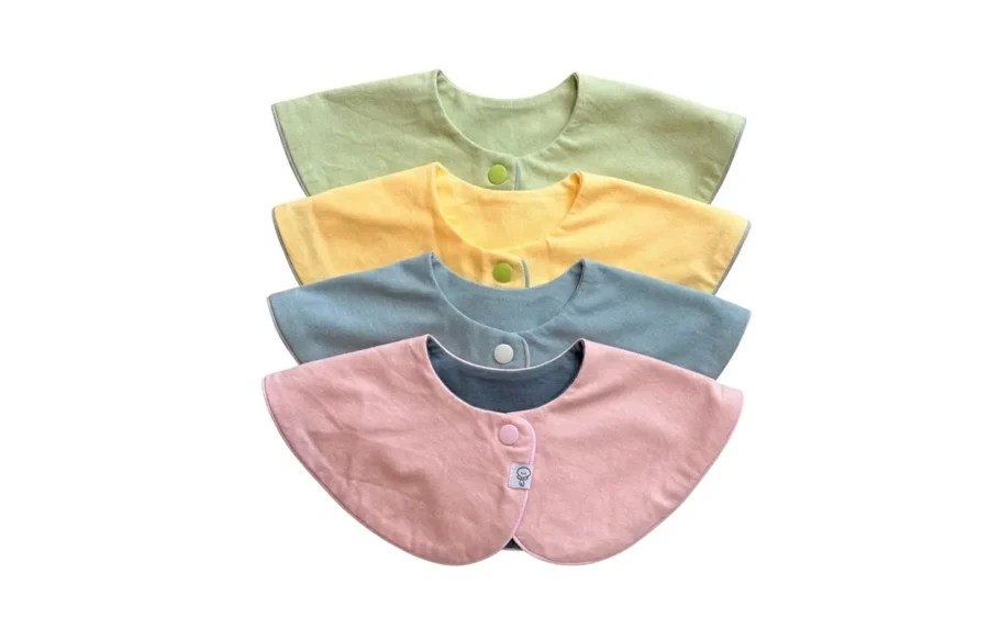 Elevate mealtime with our best baby bibs, combining 100% handcrafted cotton with a cheerful, solid-toned palette. We guarantee 2026 OEKO-TEX & GOTS safety. These vibrant bibs for baby offer artisanal charm and uncompromised comfort for every milestone.