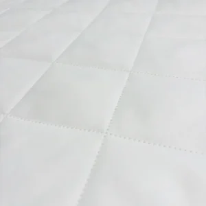 Our automated geometric diamond quilting enhances surface friction to stabilize toddlers during high-speed crawling. Our precision needlework directly secures the textile layers to prevent shifting after washing.