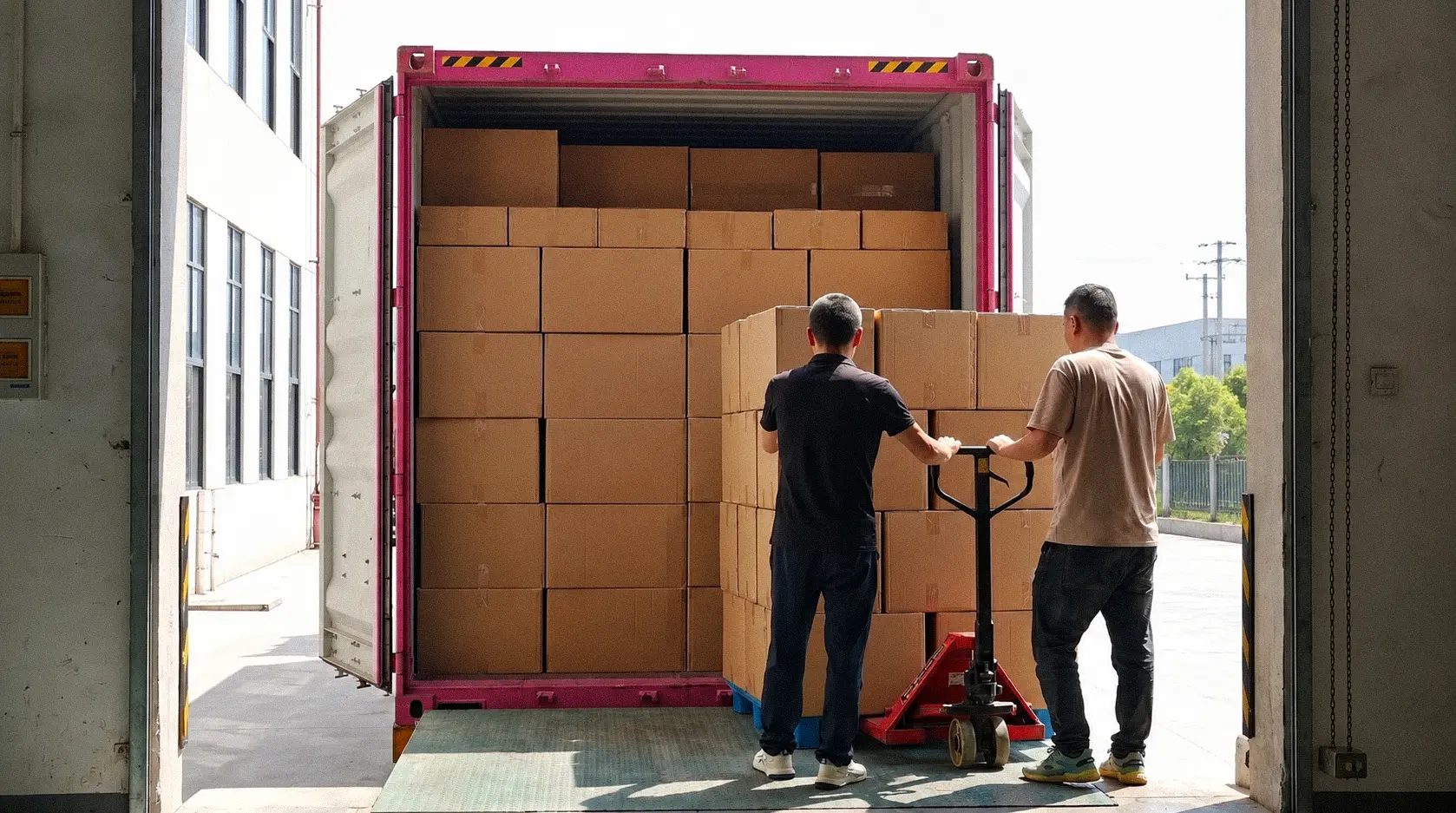 Our final Warehouse Packing & Shipping phase utilizes manual hydraulic pallet jacks. Our logistics handlers carefully stack our export-grade cartons inside our sea freight container.