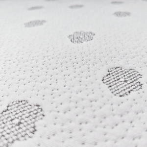 The integrated outer cover of this infant mattress showcases an anti-bacterial knit jacquard fabric with a repeating cloud motif. Our factory manufactures OEKO-TEX compliant bedding featuring natural hypoallergenic properties.