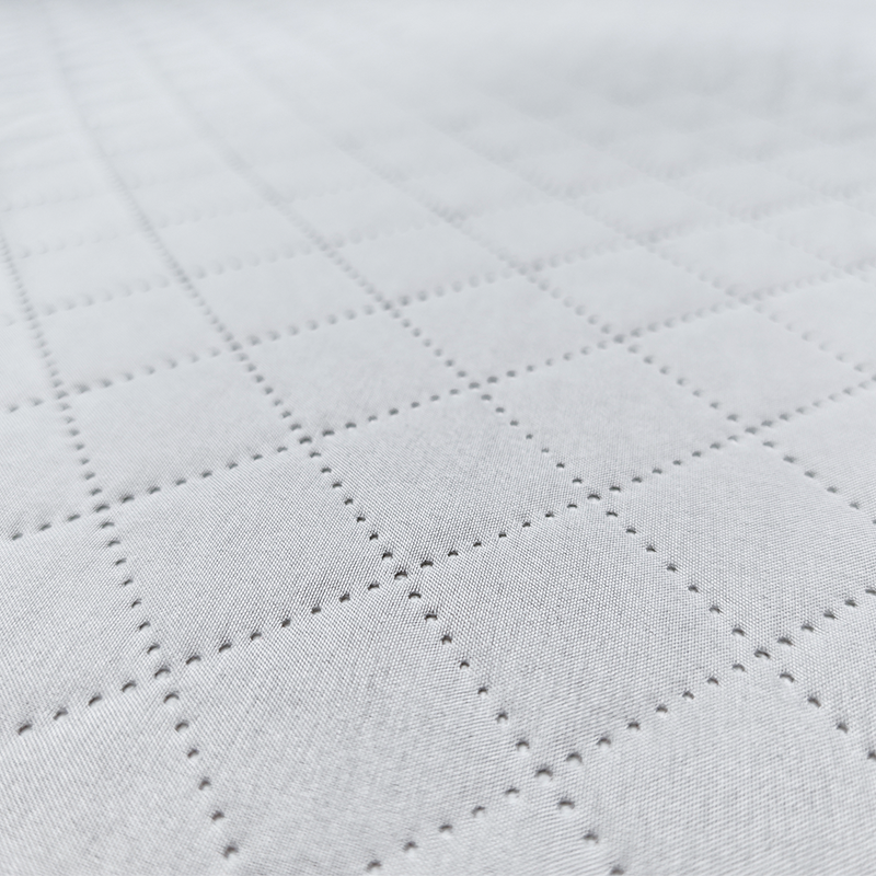 The removable cover on our infant mattress features a smooth-glide, concealed zipper track for optimal sanitation. Our factory provides certified safe textiles built for commercial laundering cycles.