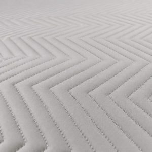 This wholesale baby mattress cover features an advanced ultrasonic quilted V-stripe pattern that eliminates traditional needle holes. The embossed textile texture creates a soft, highly breathable sleep surface that directly provides flat body support for babies.