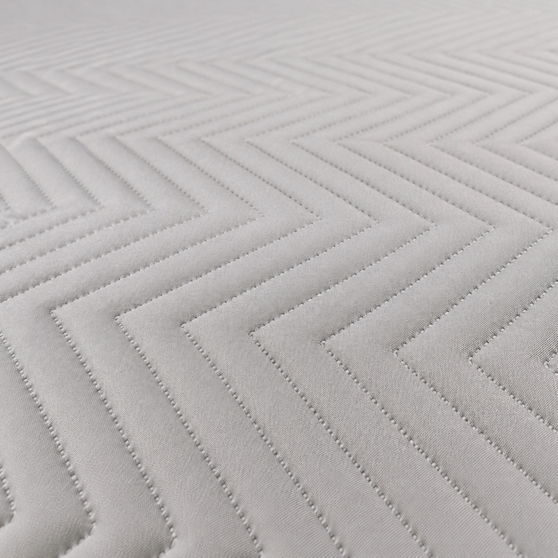 This wholesale baby mattress cover features an advanced ultrasonic quilted V-stripe pattern that eliminates traditional needle holes. The embossed textile texture creates a soft, highly breathable sleep surface that directly provides flat body support for babies.
