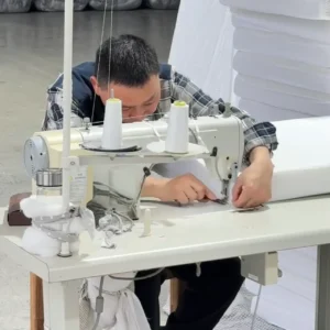 During the fabric assembly phase, our skilled technicians operate high-speed industrial flatbed sewing machines to execute highly precise workmanship. This manual stitch guidance ensures tight tolerances and maximum seam strength along all outer fabric panels, forming a robust protective enclosure tailored perfectly for institutional and retail demands.