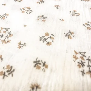 This high-resolution close-up reveals the fine muslin weave texture and exceptional print clarity of our baby bibs. Our factory uses premium cotton yarn and precision looms to create superior quality bibs for baby with outstanding absorbency and durability.