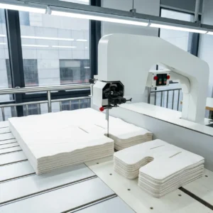 Our precision opening and slotting strategies use automated industrial machinery to create flawless leg-divided profiles and specialized harness slots. As a high-capacity baby textile factory in China, we deliver clean interior openings that maintain strict structural stability under continuous stress.