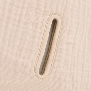 Our high-end manufacturing process implements specialized edge-processing to finely lock all critical areas, including stroller harness slots. As a dedicated baby textile factory in China, we ensure these specialized inner cutouts receive flat, burr-free binding to comprehensively eliminate physical friction that could irritate an infant's delicate skin.