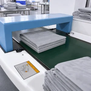 Our production line subjects all finished products to full-spectrum scanning by high-sensitivity industrial conveyor needle detectors. This automated safety protocol thoroughly scans stacked or folded textiles to completely eliminate any potential risk of metallic residuals or broken needles.