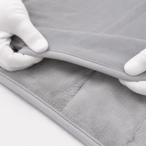 Before final packaging, our quality control team conducts hands-on reviews of stitch density, seam strength, and edge binding alignment. We perform complete physical inspections against global benchmarks to guarantee that all seams remain perfectly flat, burr-free, and structurally consistent under stress.