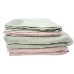 Muslin cotton two-piece set multi-color combination display showcases soft blush pink and sage green coordinate placement. Without pillow and quilt cores clearly displaying pillowcase and duvet cover design and texture. We provide professional OEM customization supporting multi-color customization, batch matching, and comprehensive customization services.