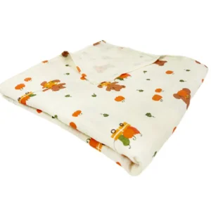 Charming Harvest Joy muslin cotton blanket featuring adorable bears and pumpkins in warm autumn tones. 100% pure muslin with excellent softness and breathability. Perfect for multiple uses. OEM/ODM wholesale from Chinese B2B baby textile factory.