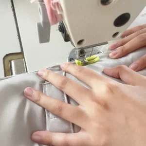 Our main cushion assembly phase integrates the exterior woven fabric with the thick internal padding using reinforced industrial sewing machines. Our baby textile factory in China utilizes skilled technical operators to guarantee absolute structural integrity and neat border seams across every batch.