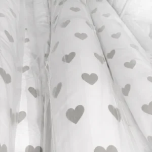 Our industrial rolls of heart-pattern printed fabric are tightly wrapped to preserve raw material cleanliness and quality directly from the source. Our advanced baby textile factory in China manages high-volume roll production to facilitate seamless bulk manufacturing.