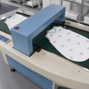 Industrial needle detectors execute a full-spectrum metal scan as the final line of defense in our quality assurance system. Operating as a reliable baby textile factory in China, we run every single garment through high-sensitivity detection tunnels to completely eliminate the risk of metal residuals prior to packaging.