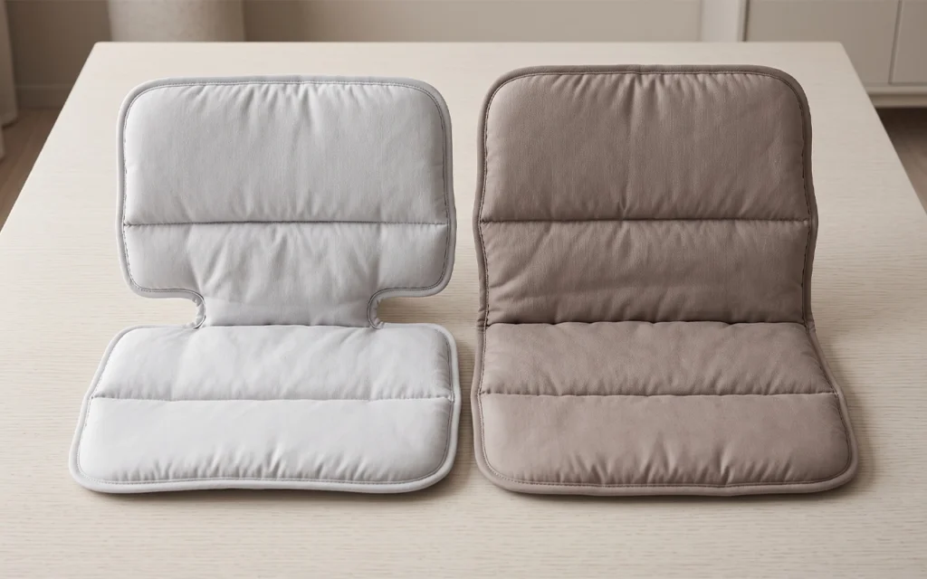 We present both solid-color high-chair cushions with different seat and backrest proportions, showing how padding distribution, panel divisions, shape, thickness, and color change product positioning.