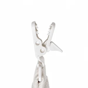 Our close-up shows a white PU plastic clip with gripping teeth, pivot mechanism, and a lower ring linked to a gathered polyester elastic strap for secure, convenient pacifier access in daily routines.